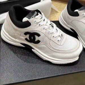 CHANEL (Chanel) 22K Autumn/Winter Black and White Panda Mesh Leather Low-Top Run
